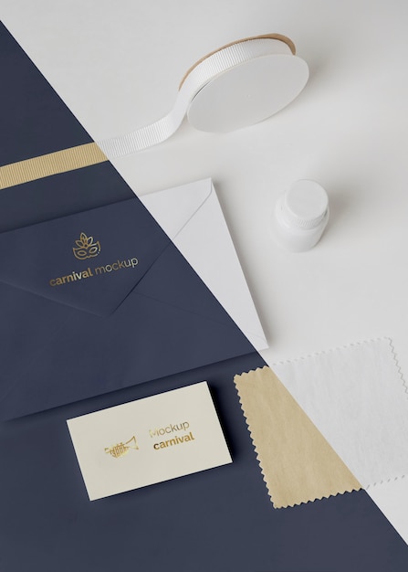 high angle of carnival invitation in envelope with tape