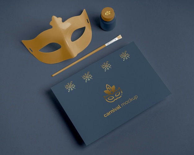 PSD high angle of carnival invitation mask and paint brush