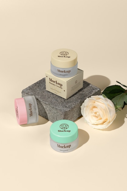 high angle cream containers and flower