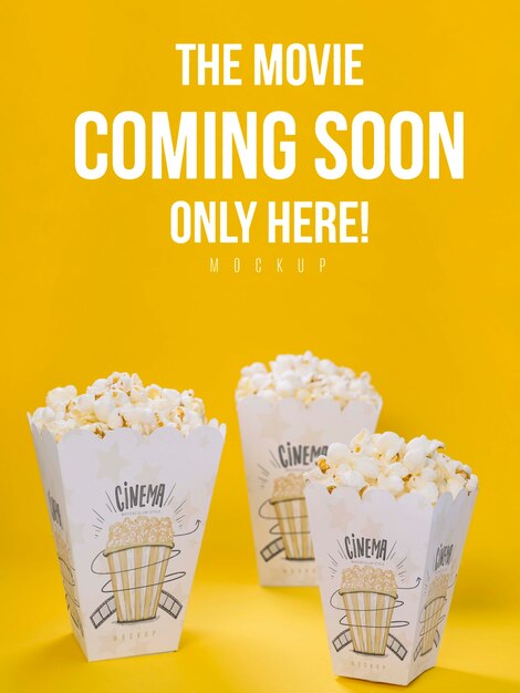 High angle of cups with popcorn for cinema