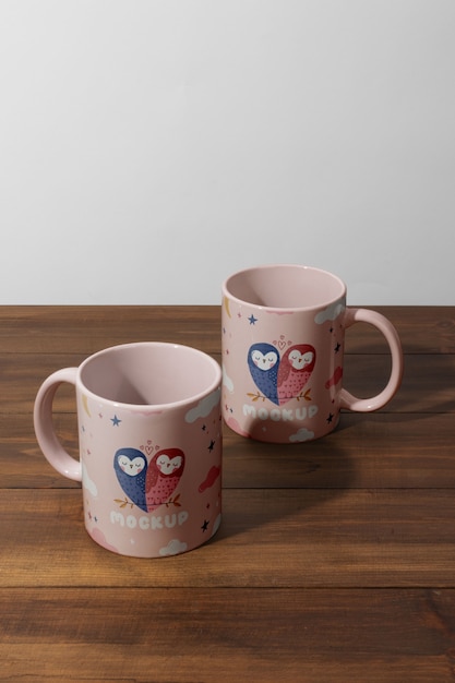 High angle love cups on wooden table