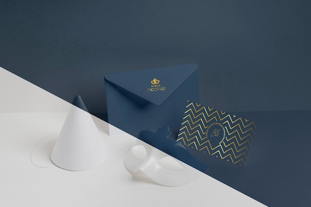 PSD high angle of minimalistic carnival invitation in envelope and cone