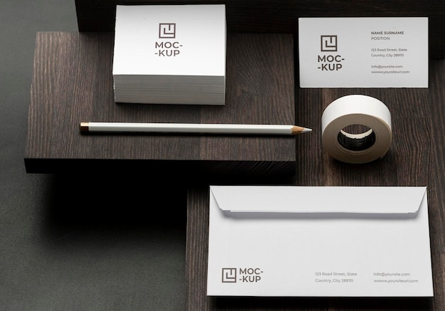 high angle mock-up stationery on wood composition