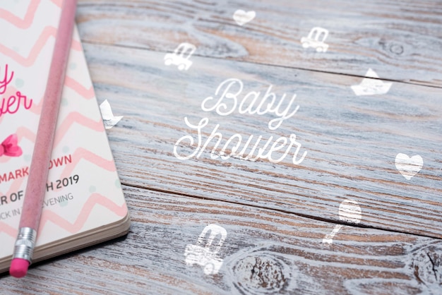 high angle of notebook for baby shower