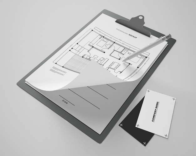 PSD alto angolo di blocco note mock-up con carte e penna