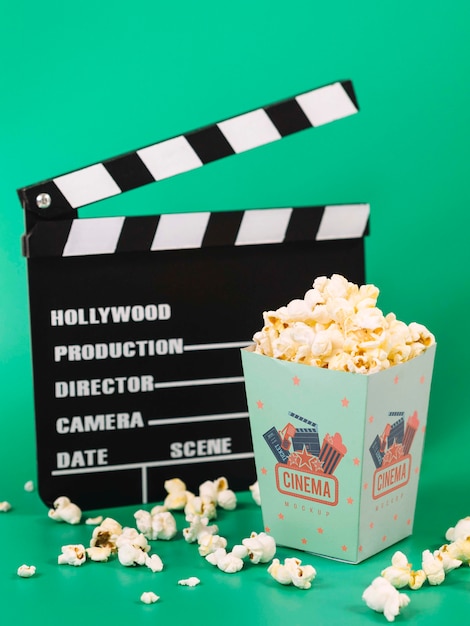 PSD high angle of popcorn with clapperboard