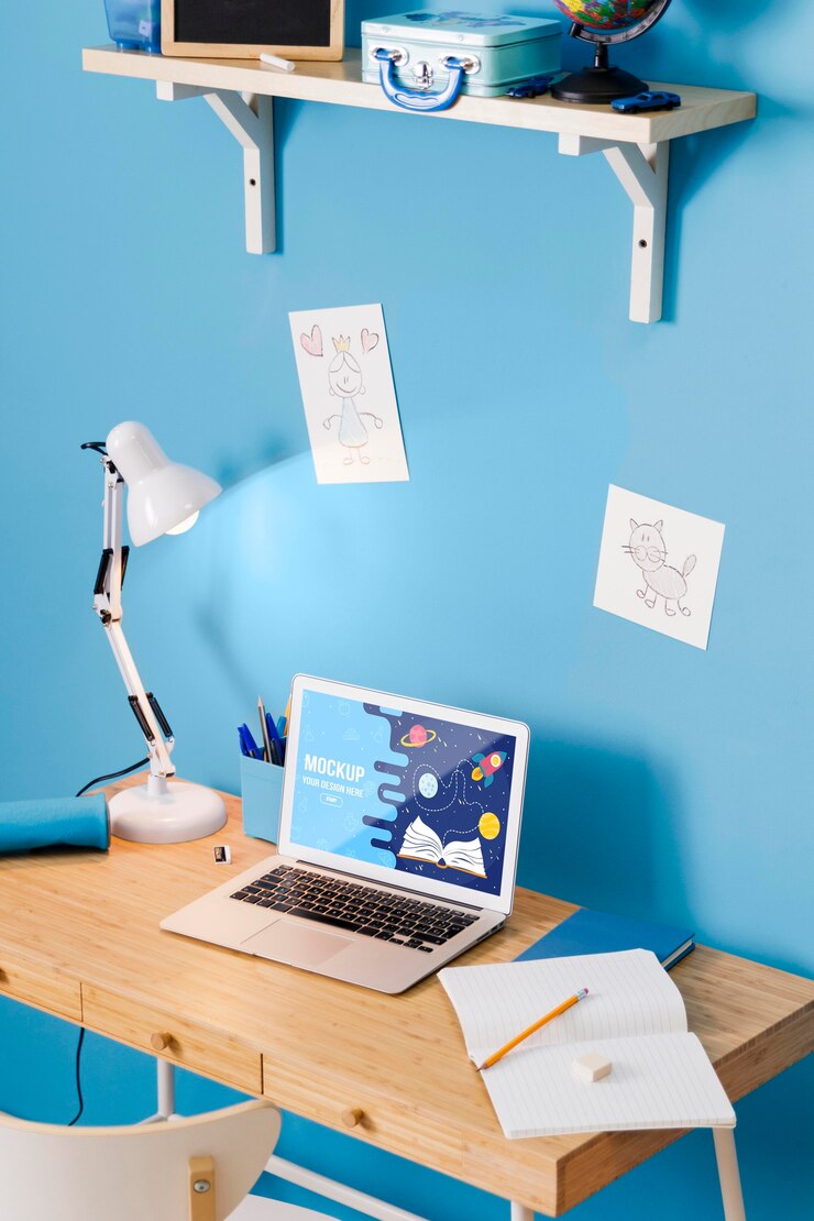 PSD high angle of school desk with laptop and lamp