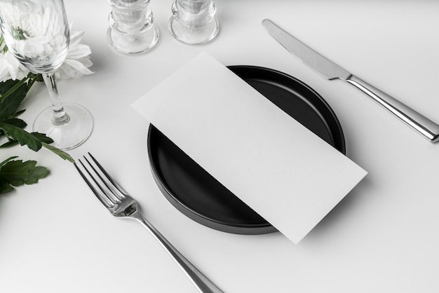 PSD high angle of table arrangement with spring menu mock-up and cutlery