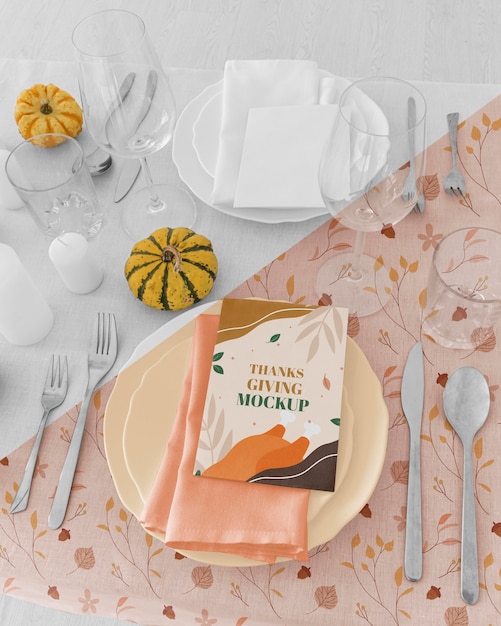 High angle of thanksgiving dinner table arrangement with cutlery