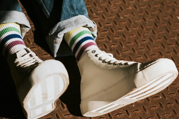 High top white sneakers mockup on model casual style