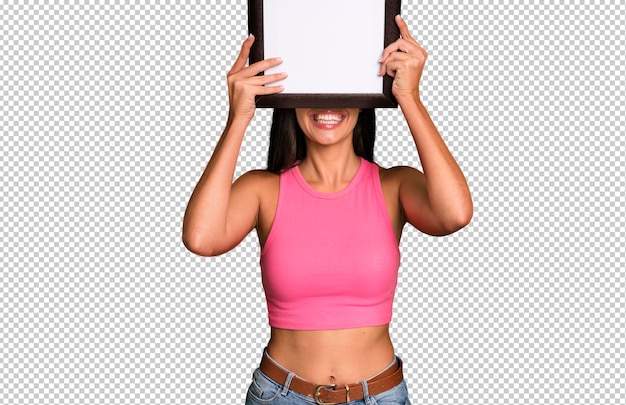 PSD hispanic pretty young adult and expressive woman holding a white blank frame