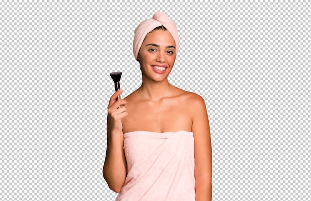 Hispanic pretty young adult and expressive woman wearing bathrobe beauty and make up concept