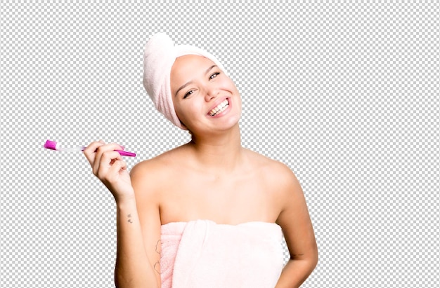 Испанская симпатичная молодая женщина в халате и зубной щетке