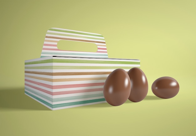Hoge hoek cartoon doos met chocolade-eieren