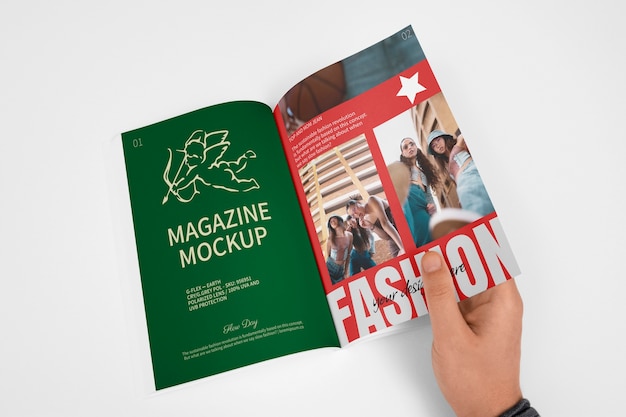 holding magazine mockup design