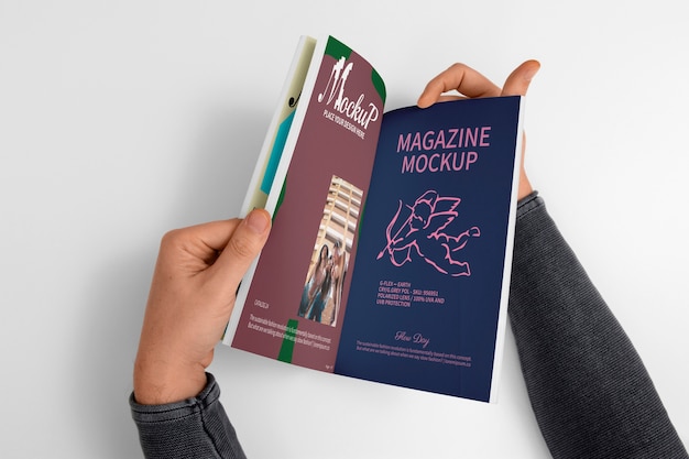 Holding magazine mockup design