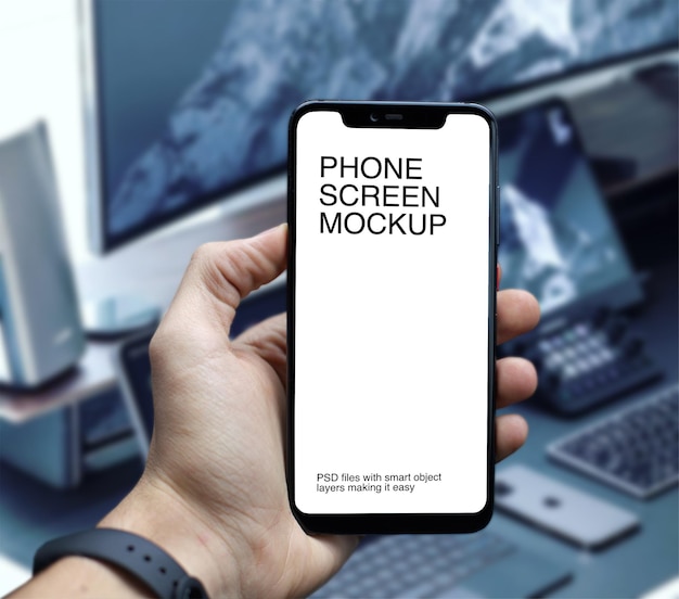 PSD holding smartphone with screen mockup