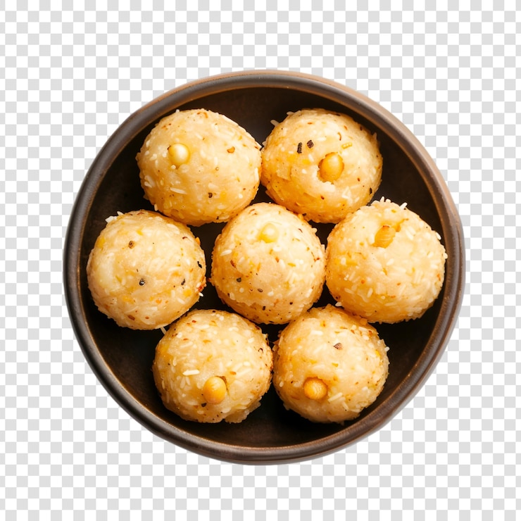 PSD homemade coconut sweet laddu on a bowl with white background