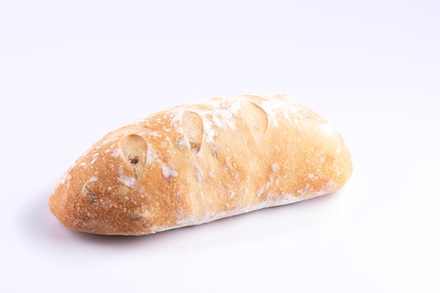 Homemade wholemeal natural fermentation bread baked isolated on white background close up