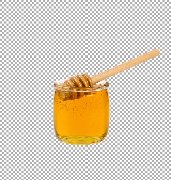 honey pot with wooden spoon isolated