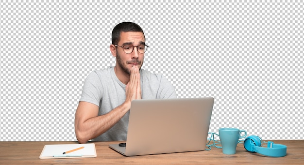 PSD hopeful young man sitting at his desk