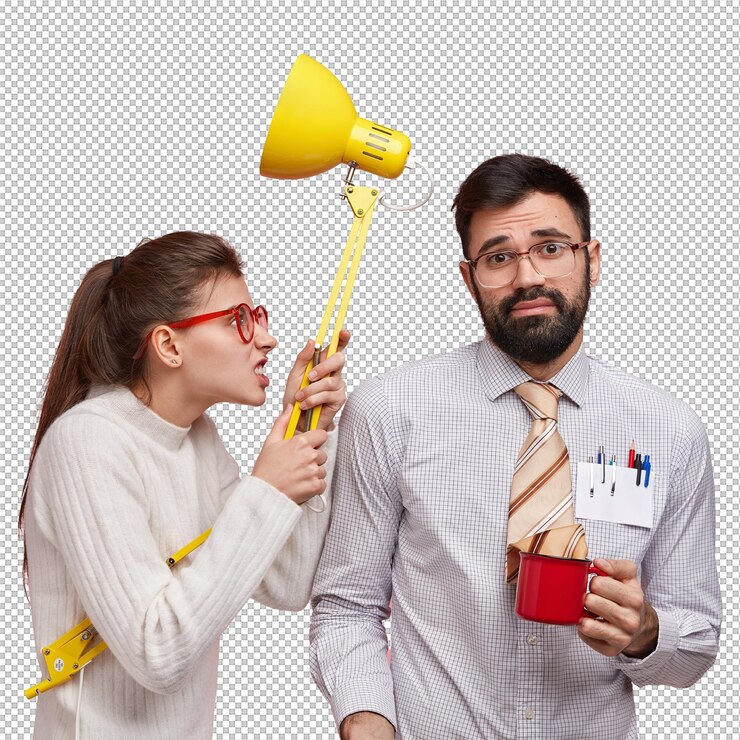 PSD horizontal shot of dissatisfied peevish college student carries lamp clenches teeth and looks with irritation at classmate