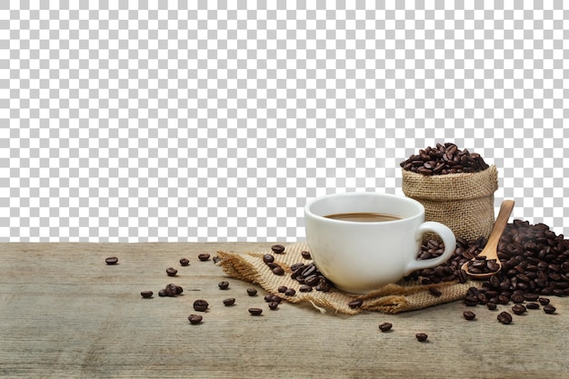 PSD hot coffee cup with coffee beans on the wooden table with transparent background png