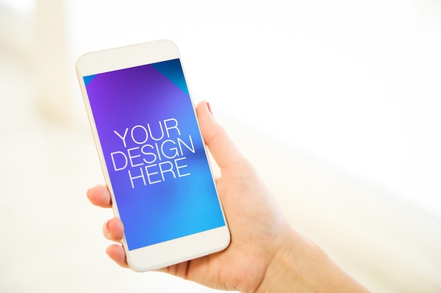 Human holding smartphone mockup