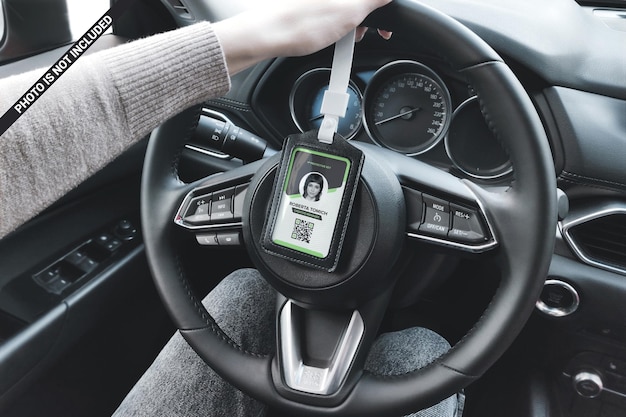 PSD id card in a leather holder on the steering wheel mockup