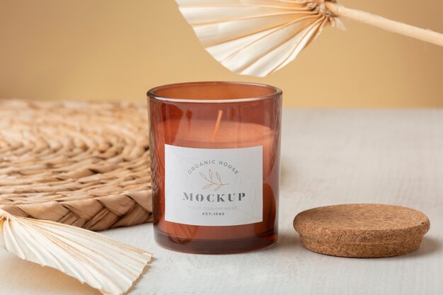 Indoor wax candle in glass jar with label mock-up