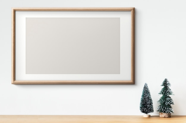 Interior wooden frame mockup with Christmas tree decorations