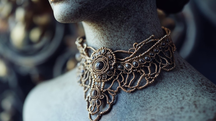 PSD intricate gold wire necklace with dark beads on mannequin