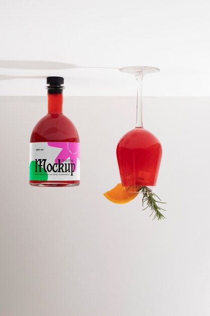 Inverted bottle with label mockup