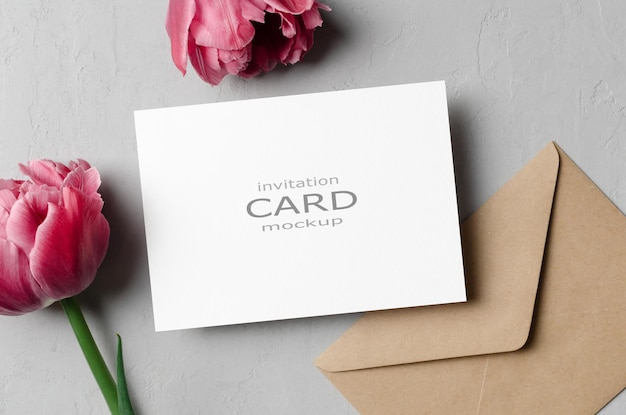 Invitation card mockup with envelope and pink tulips flowers