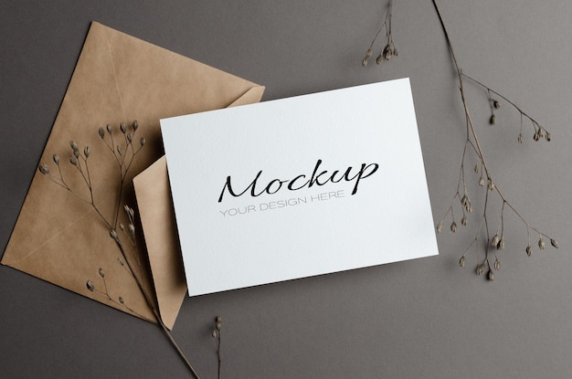 Invitation or greeting card mockup with dry twigs and envelope