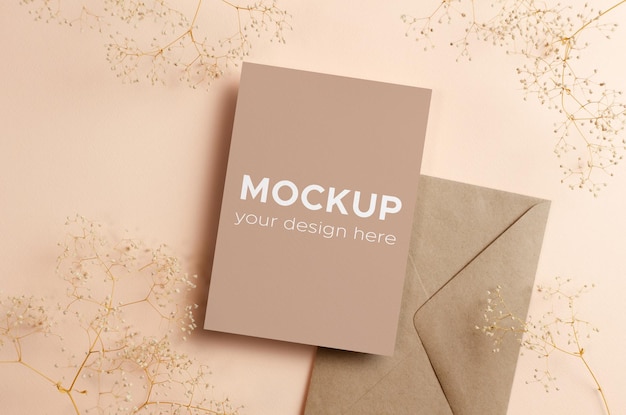 Invitation or greeting card mockup with envelope and dry gypsophila flowers