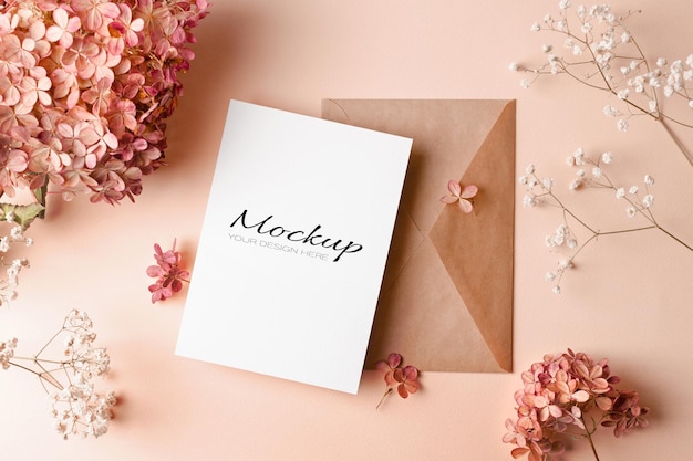 Invitation or greeting card mockup with gypsophila and hydrangea flowers