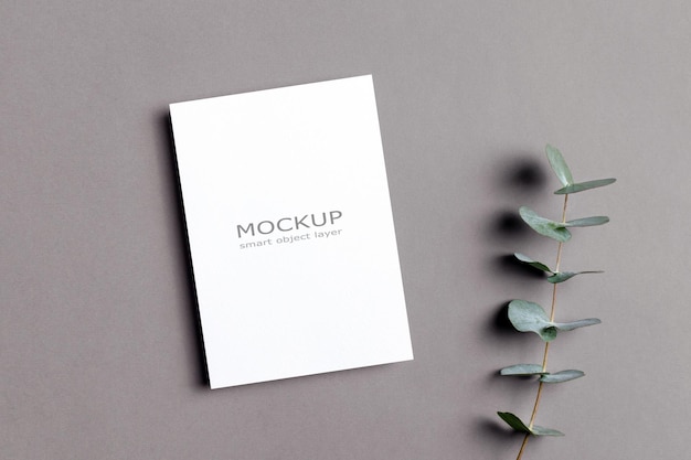 Invitation or greeting card mockup with natural eucalyptus