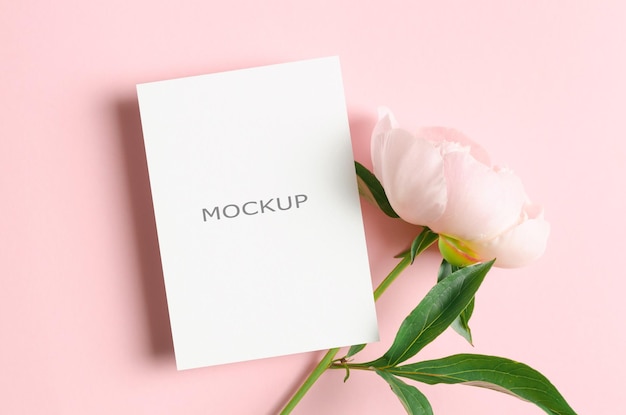 PSD invitation or greeting card mockup with pink peony flowers