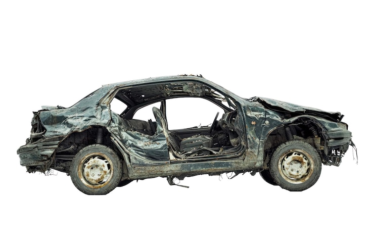PSD isolated severely crushed car with torn metal body transparent background png