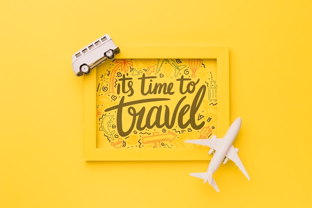 it's time to travel, lettering on yellow frame with van and airplane
