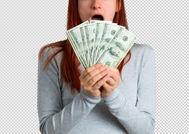 Jong roodharigemeisje dat heel wat geld neemt