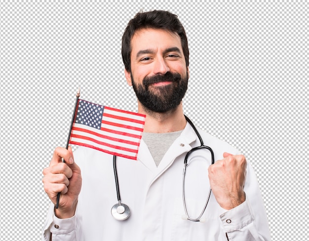 Jonge arts die een amerikaanse vlag houdt