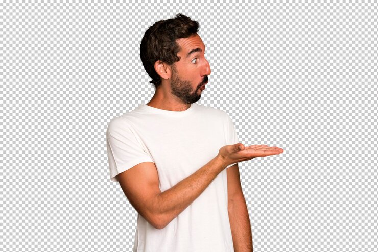 PSD jonge gekke bebaarde en expressieve man met een kopieerruimte aan de zijkant