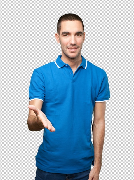 Jonge man met handschudgebaar