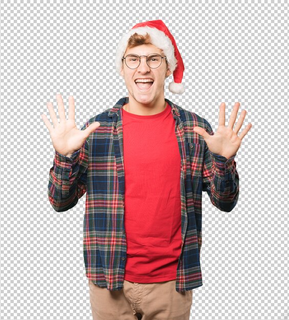 Jonge man met kerstmis die gebaren doet