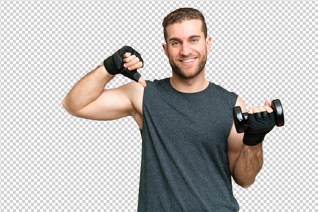Jonge man sporten gewichtheffen over geïsoleerde chroma sleutel achtergrond trots en zelftevreden