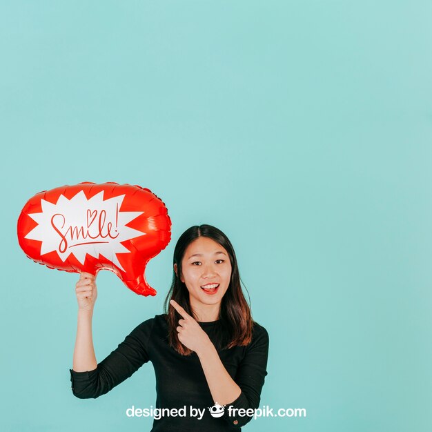 Joyful woman with speech balloon mockup