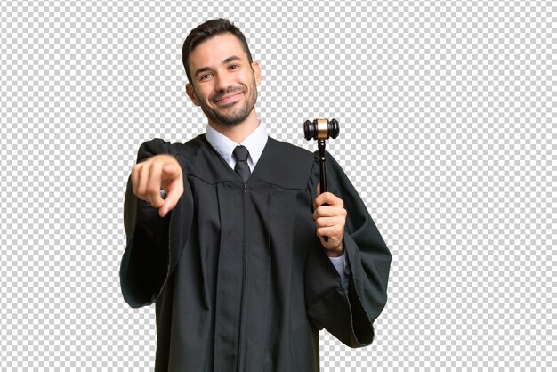 Judge caucasian man over isolated background pointing front with happy expression