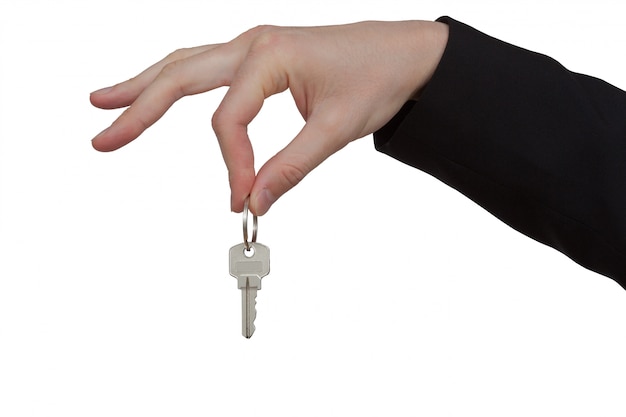 Key in hand on a white background